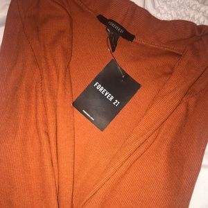 orange rust v-neck bodysuit 🍊